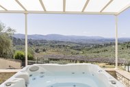 Suite di charme con vasca Jacuzzi su terrazza panoramica e sauna - Agritourisme La Fattoria di Maiano